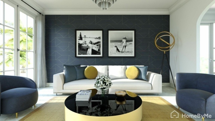 Glam living room with touches of blue and gold and black and white paintings