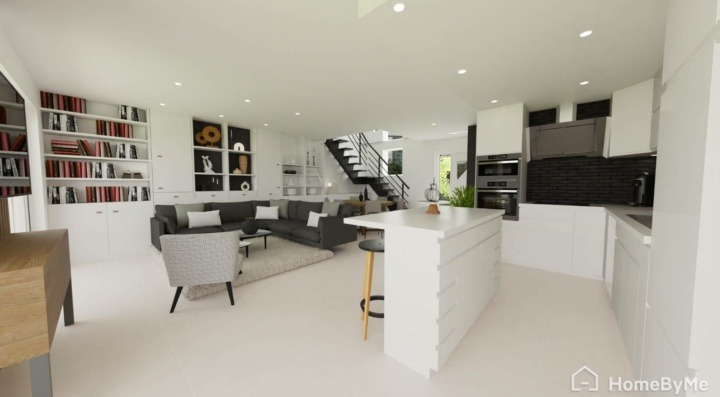 View of an open kitchen in white with black stairs and couch.